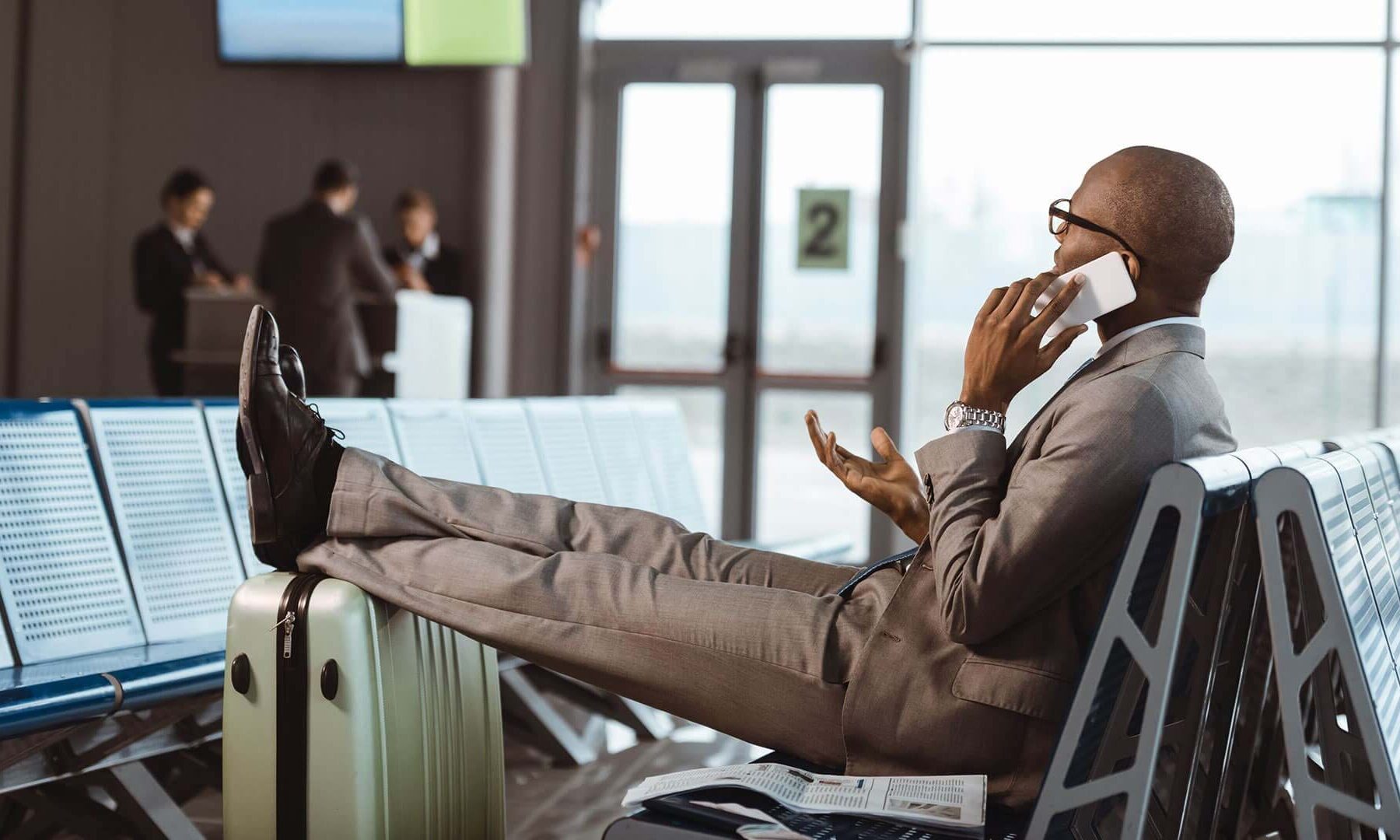 stressed business traveller needs a business travel agent